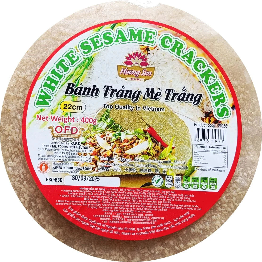 Packaged white sesame crackers with a red and green label on a white background
