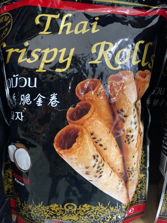 Packaged Thai crispy rolls with visible branding on a black background
