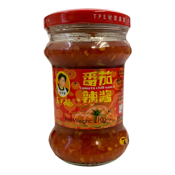 Jar of Lao Gan Ma tomato chili sauce with a red label 