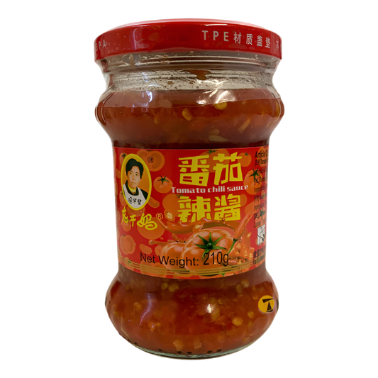 Jar of Lao Gan Ma tomato chili sauce with a red label 