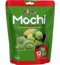 Green and red package of Royal Mochi creamy Matcha Latte  with a black bowl and green mochi
